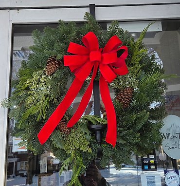 24\"mixed Christmas green wreath with a bow